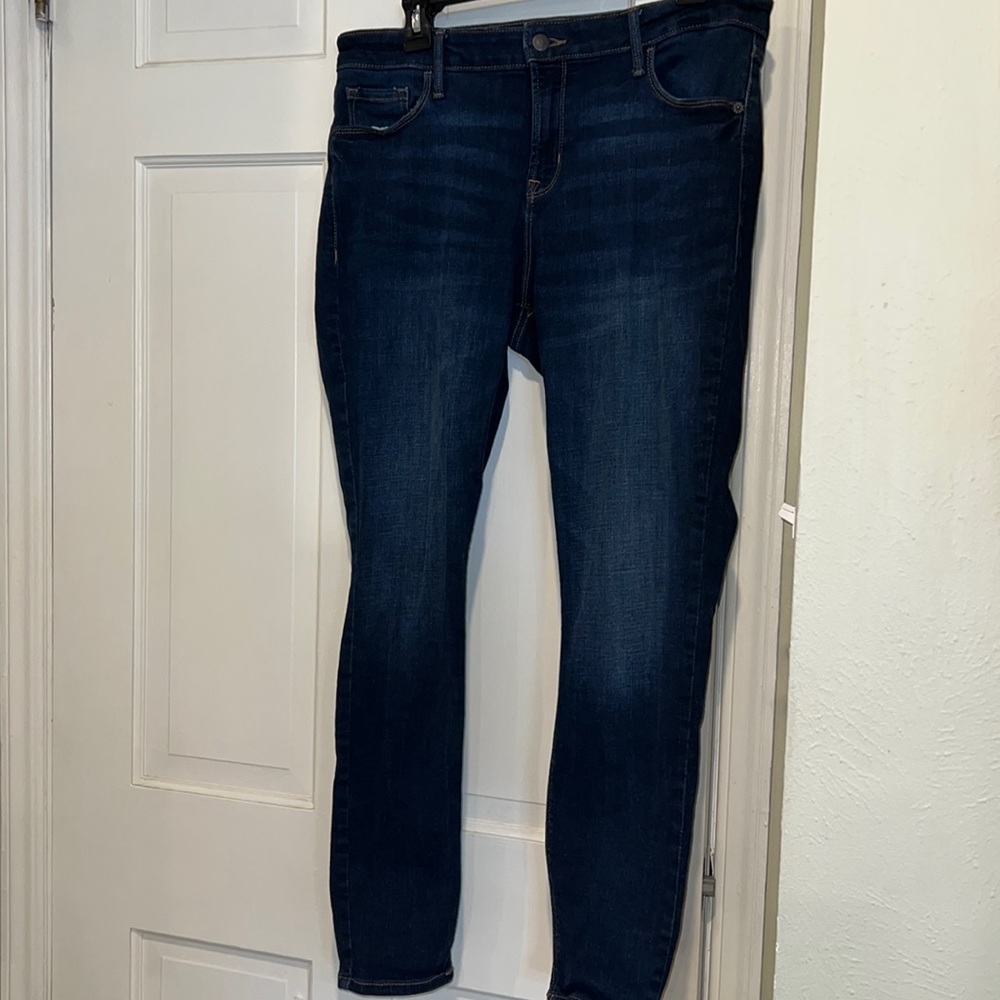 Dark wash mid-rise skinny jeans